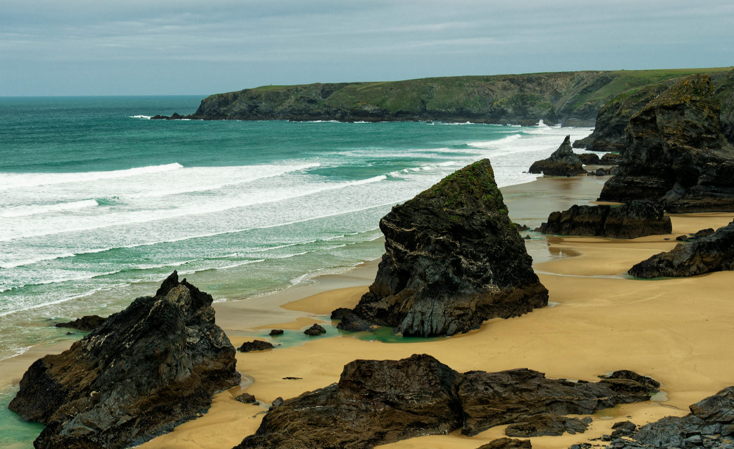 Rocks at Bedruthan Steps Beach, Cornwall, UK - Used with permission Photo by Carsten Ruthemann: https://www.pexels.com/photo/rocks-at-bedruthan-steps-beach-cornwall-uk-18810826/